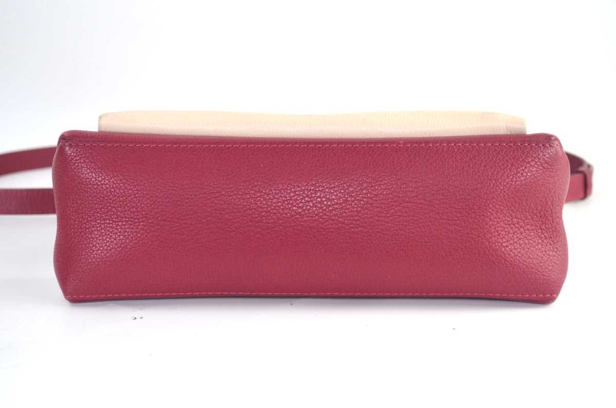 Louis Vuitton LockMe Leder Bordeaux Creme