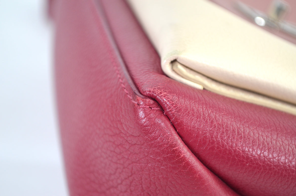 Louis Vuitton LockMe Leder Bordeaux Creme
