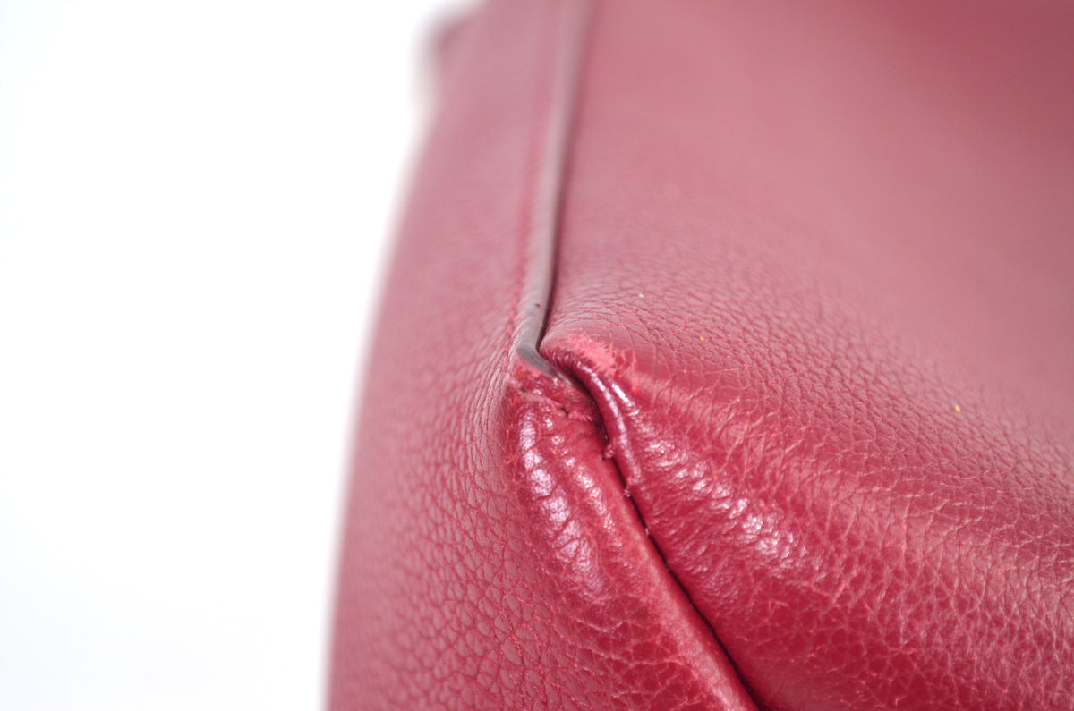 Louis Vuitton LockMe Leder Bordeaux Creme