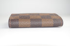 Louis Vuitton Manschettenknopf Halter Damier Ebene Canvas Braun