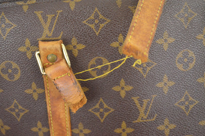 Louis Vuitton Babylon Monogram Canvas